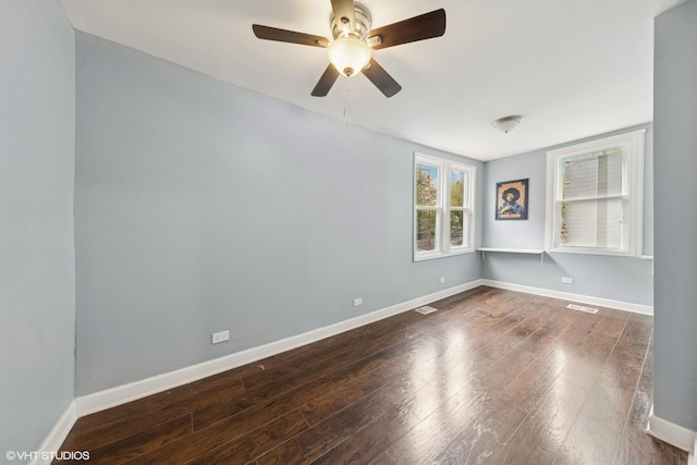 509 W 81st St, Chicago, IL 60620 - unfurnished room with a ceiling fan, baseboards, and wood finished floors