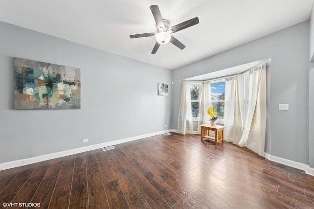 509 W 81st St, Chicago, IL 60620 - empty room with ceiling fan, wood finished floors, and baseboards