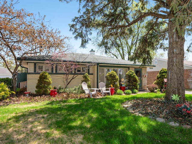 17237 Greenbay Ave, Lansing, IL 60438 - ranch-style home featuring brick siding and a front yard