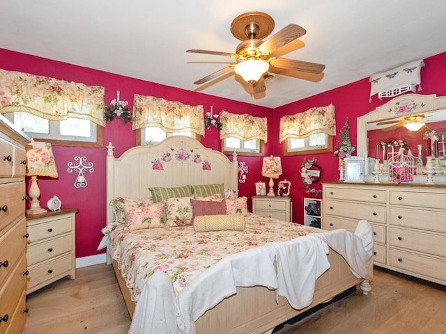 17237 Greenbay Ave, Lansing, IL 60438 - bedroom featuring ceiling fan and light wood-style flooring