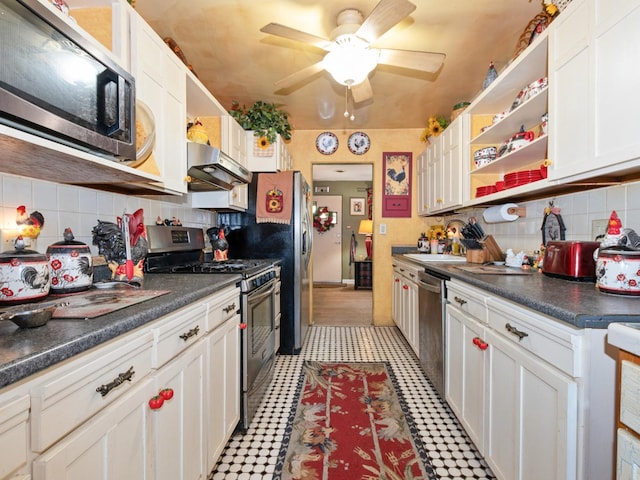 17237 Greenbay Ave, Lansing, IL 60438 - kitchen with under cabinet range hood, open shelves, backsplash, dark countertops, and appliances with stainless steel finishes