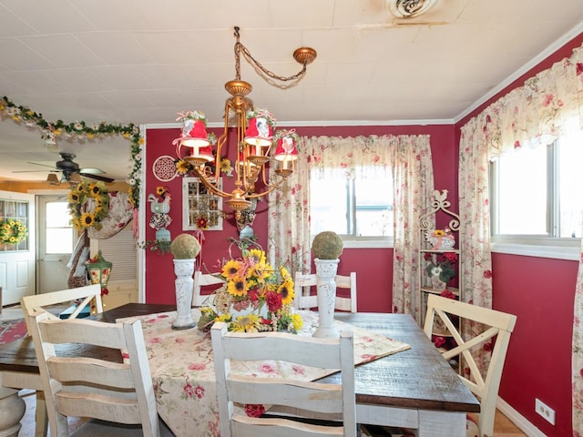 17237 Greenbay Ave, Lansing, IL 60438 - dining space with ornamental molding and ceiling fan with notable chandelier