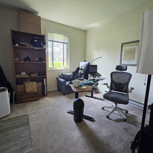 office featuring a baseboard heating unit and carpet floors