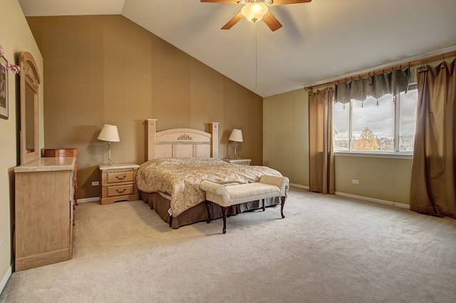 bedroom featuring light colored carpet, ceiling fan, lofted ceiling, and baseboards