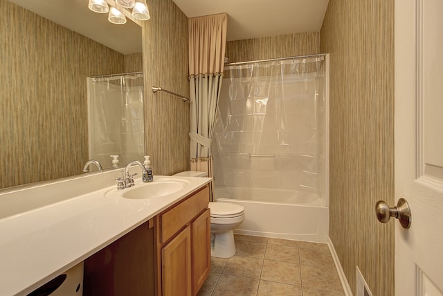 bathroom with tile patterned floors, toilet, vanity, and shower / bath combination with curtain