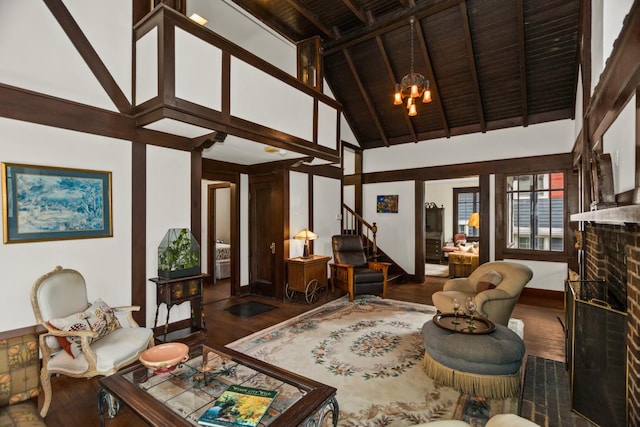 2717 Harrison St, Evanston, IL 60201 - living room with beam ceiling, a chandelier, high vaulted ceiling, stairs, and wood finished floors