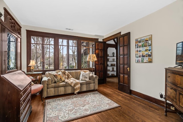 2717 Harrison St, Evanston, IL 60201 - interior space with dark wood-style flooring, visible vents, and baseboards