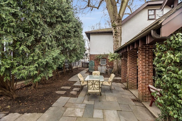 2717 Harrison St, Evanston, IL 60201 - view of patio with fence and outdoor dining area