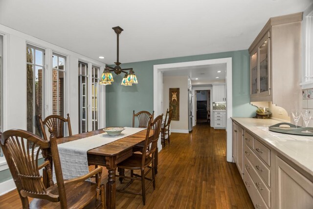 2717 Harrison St, Evanston, IL 60201 - dining area featuring recessed lighting, baseboards, and dark wood finished floors