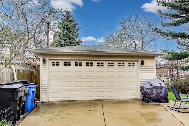 detached garage with fence