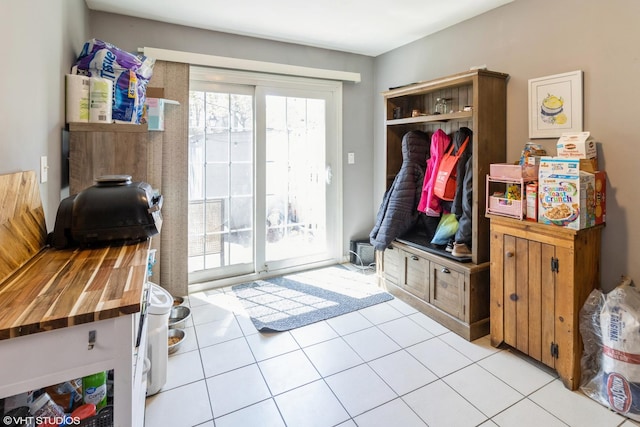 mudroom featuring light tile patterned floors