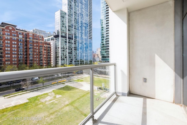 balcony featuring a view of city