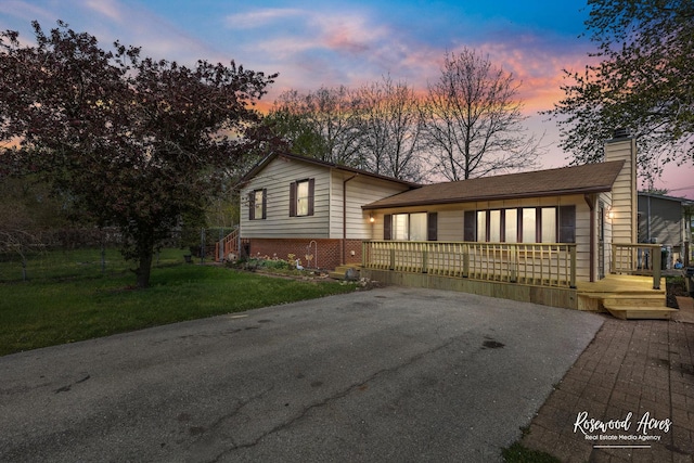 510 W 3rd St, Braidwood, IL 60408 - tri-level home with a chimney and a front yard