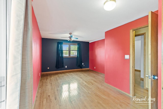 510 W 3rd St, Braidwood, IL 60408 - unfurnished room featuring baseboards, ceiling fan, and wood finished floors