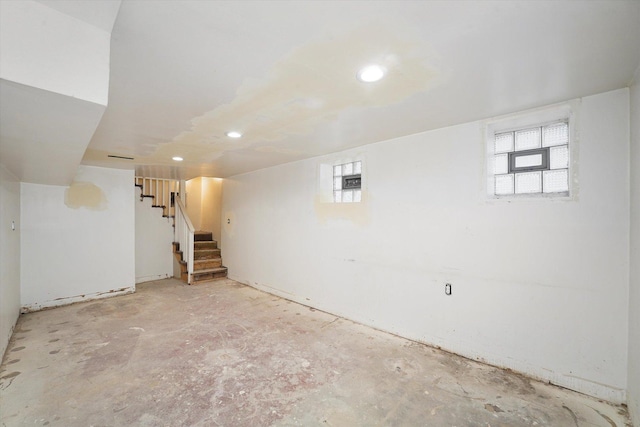 below grade area featuring recessed lighting and stairs