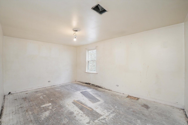 empty room with wood finished floors