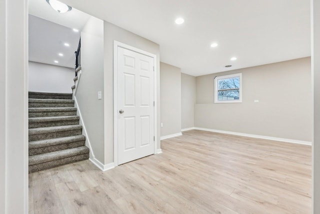 530 Thompson Ave, Winthrop Harbor, IL 60096 - basement with baseboards, stairway, light wood-style floors, and recessed lighting
