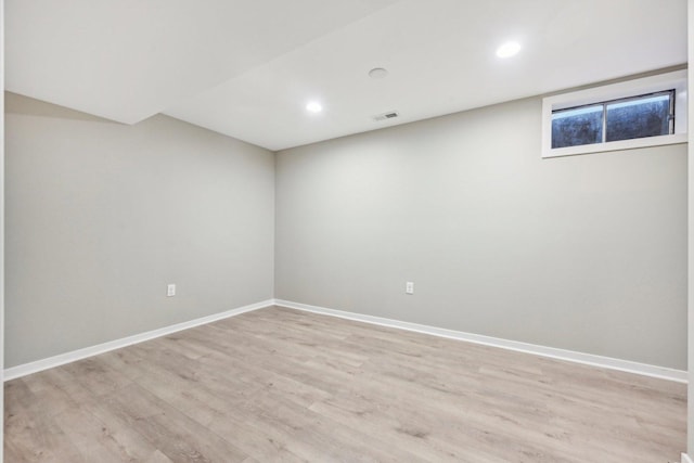 530 Thompson Ave, Winthrop Harbor, IL 60096 - below grade area featuring visible vents, baseboards, recessed lighting, and light wood-style floors