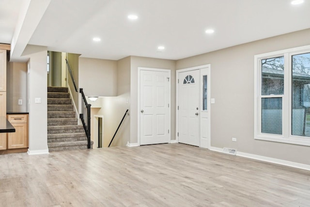 530 Thompson Ave, Winthrop Harbor, IL 60096 - entrance foyer featuring light wood-style flooring, stairway, visible vents, baseboards, and recessed lighting