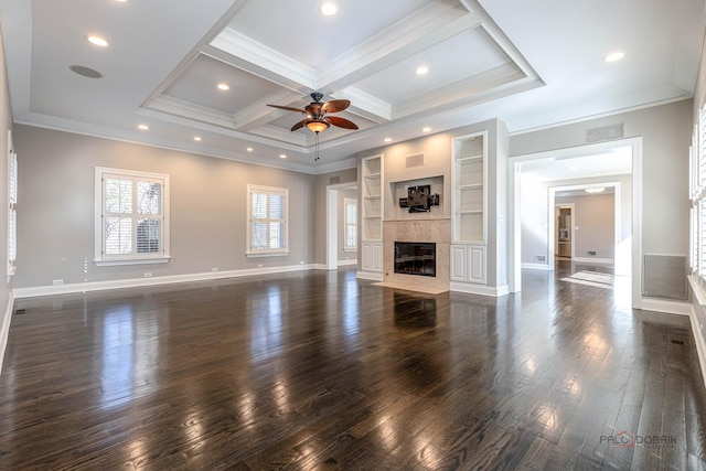 unfurnished living room with ornamental molding, ceiling fan, and dark wood-type flooring