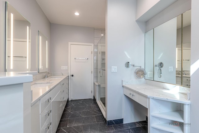 bathroom featuring recessed lighting, a shower stall, and vanity