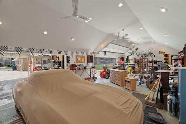 garage with recessed lighting, ceiling fan, and visible vents