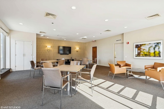dining space with carpet flooring and recessed lighting