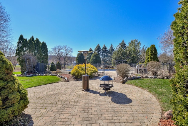 view of patio featuring fence