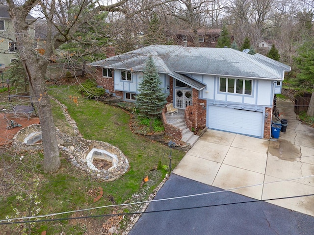 8360 W 100th Pl, Palos Hills, IL 60465 - raised ranch with a garage, aphalt driveway, roof with shingles, a chimney, and brick siding