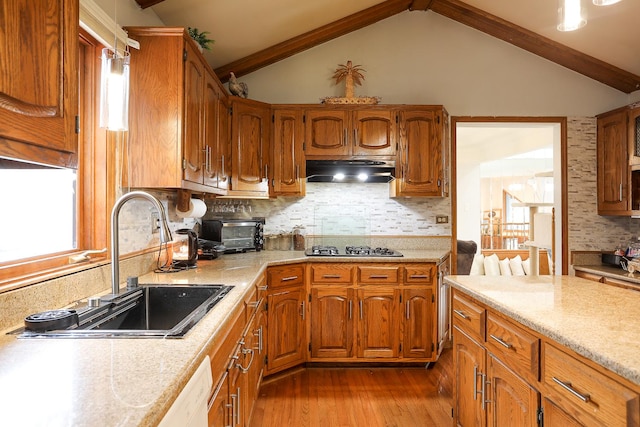 8360 W 100th Pl, Palos Hills, IL 60465 - kitchen with a sink, light countertops, extractor fan, lofted ceiling, and dark wood-style floors