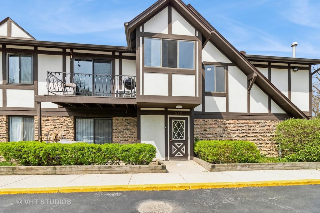 246 George St Unit C, Bensenville, IL 60106 - exterior space featuring stucco siding and a balcony