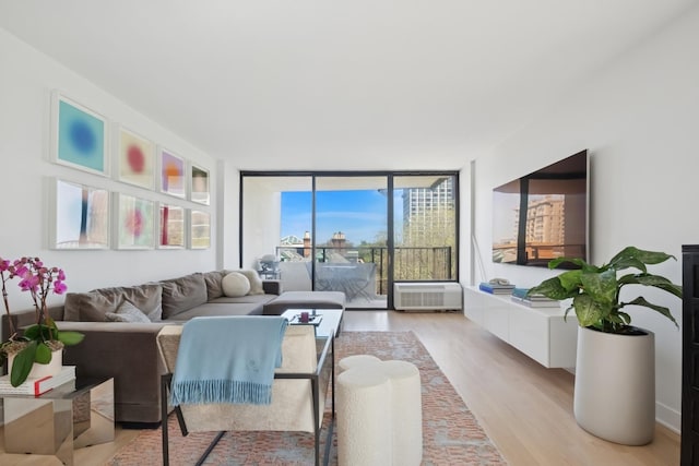 1450 N Astor St Unit 8A, Chicago, IL 60610 - living area with light wood finished floors and a wall of windows