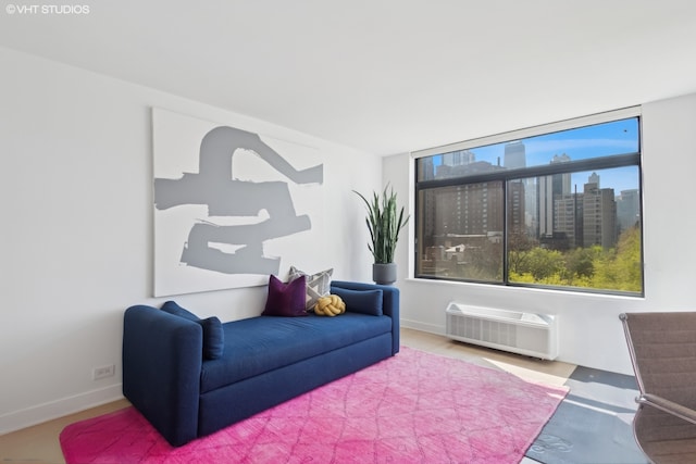 1450 N Astor St Unit 8A, Chicago, IL 60610 - sitting room featuring baseboards, a wall unit AC, and a city view