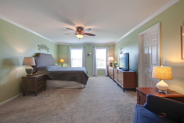 bedroom with crown molding, ceiling fan, light carpet, and baseboards