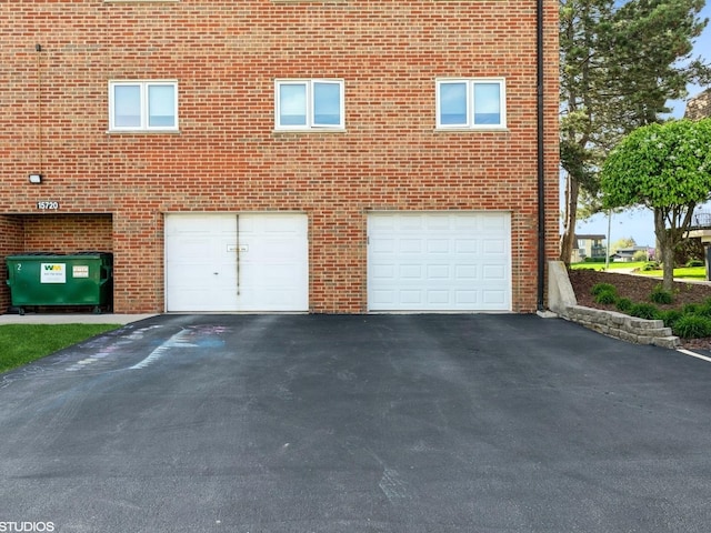 15720 Deerfield Ct Unit 2N, Orland Park, IL 60462 - garage featuring driveway
