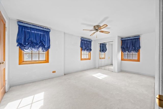2500 S 7th Ave, North Riverside, IL 60546 - carpeted empty room featuring a ceiling fan and baseboards