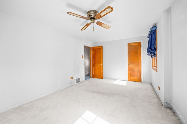2500 S 7th Ave, North Riverside, IL 60546 - unfurnished bedroom with light carpet, baseboards, and ceiling fan