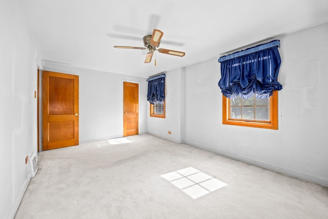 2500 S 7th Ave, North Riverside, IL 60546 - unfurnished bedroom with carpet flooring, a ceiling fan, and baseboards