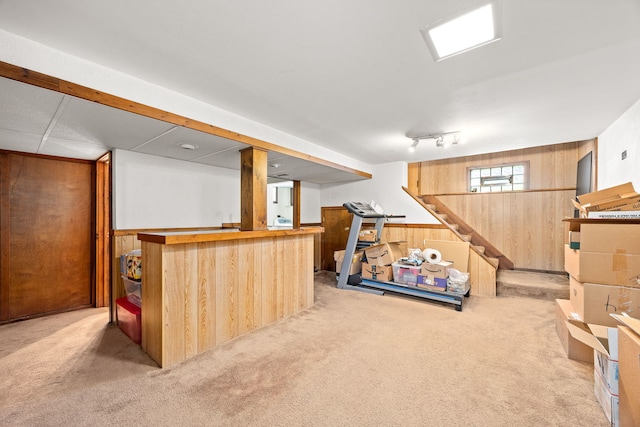 2500 S 7th Ave, North Riverside, IL 60546 - basement featuring wood walls, carpet floors, stairs, bar area, and a wainscoted wall