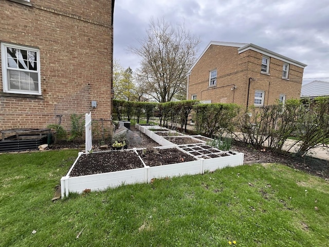 2500 S 7th Ave, North Riverside, IL 60546 - view of grassy yard with a vegetable garden