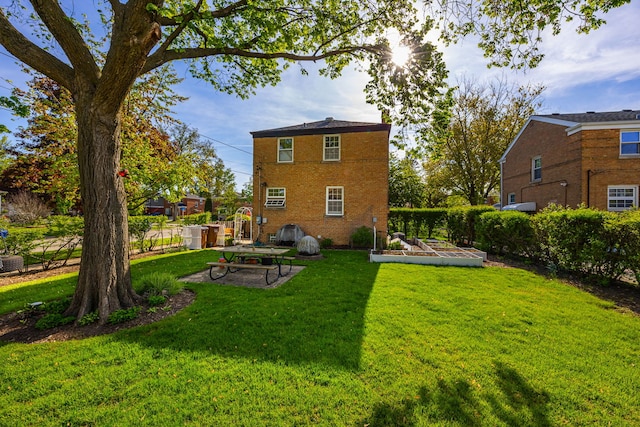 2500 S 7th Ave, North Riverside, IL 60546 - rear view of property with a garden and brick siding