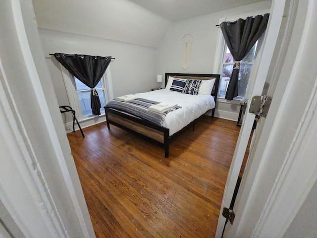 475 Laurel St, Elgin, IL 60120 - bedroom with lofted ceiling and wood finished floors
