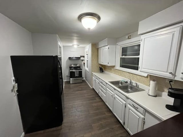 475 Laurel St, Elgin, IL 60120 - kitchen with stainless steel electric stove, freestanding refrigerator, a sink, white cabinets, and light countertops