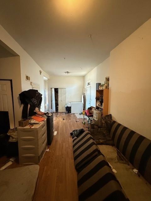 living area with wood finished floors