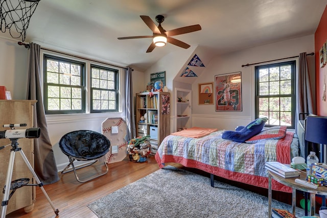 403 W 13th St, Sterling, IL 61081 - bedroom with lofted ceiling, a ceiling fan, and wood finished floors