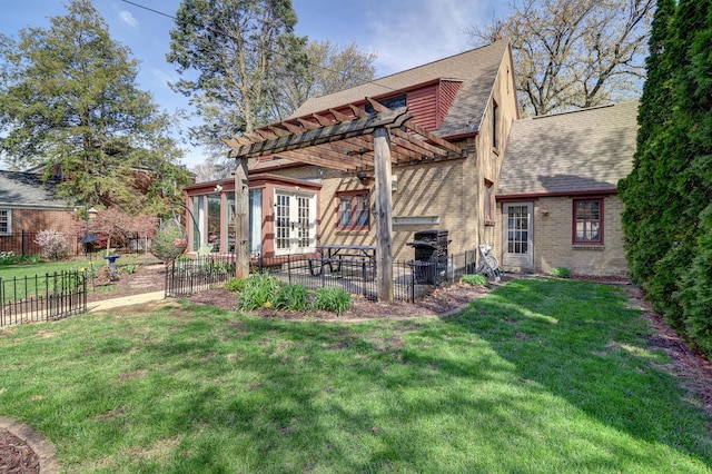 403 W 13th St, Sterling, IL 61081 - back of property featuring a pergola, fence, a yard, and a patio area