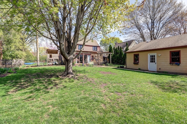 403 W 13th St, Sterling, IL 61081 - back of house with a lawn, fence, a pergola, and a patio