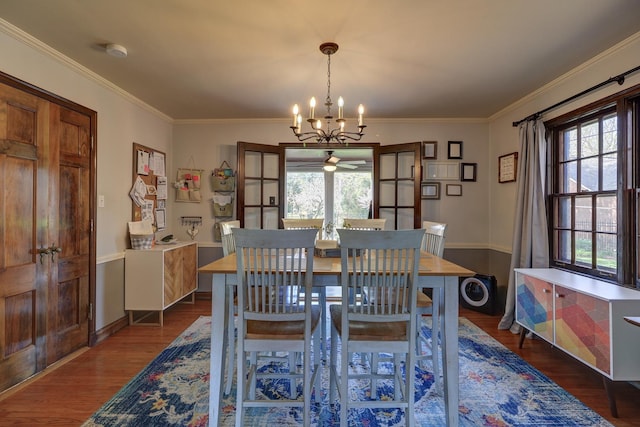 403 W 13th St, Sterling, IL 61081 - dining area featuring a wealth of natural light, crown molding, and dark wood-style flooring
