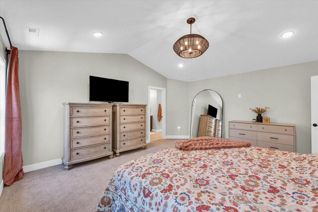 2102 Slade Ln E, Mahomet, IL 61853 - bedroom with an inviting chandelier, light carpet, baseboards, lofted ceiling, and visible vents