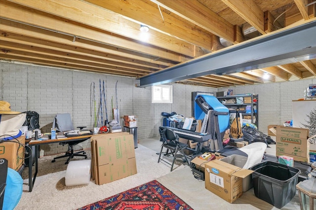 2102 Slade Ln E, Mahomet, IL 61853 - basement featuring brick wall